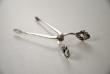 A Pair of Georg Jensen Silver Sugar Tongs: Acorn Pattern