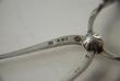 A Pair of Georg Jensen Silver Sugar Tongs: Acorn Pattern