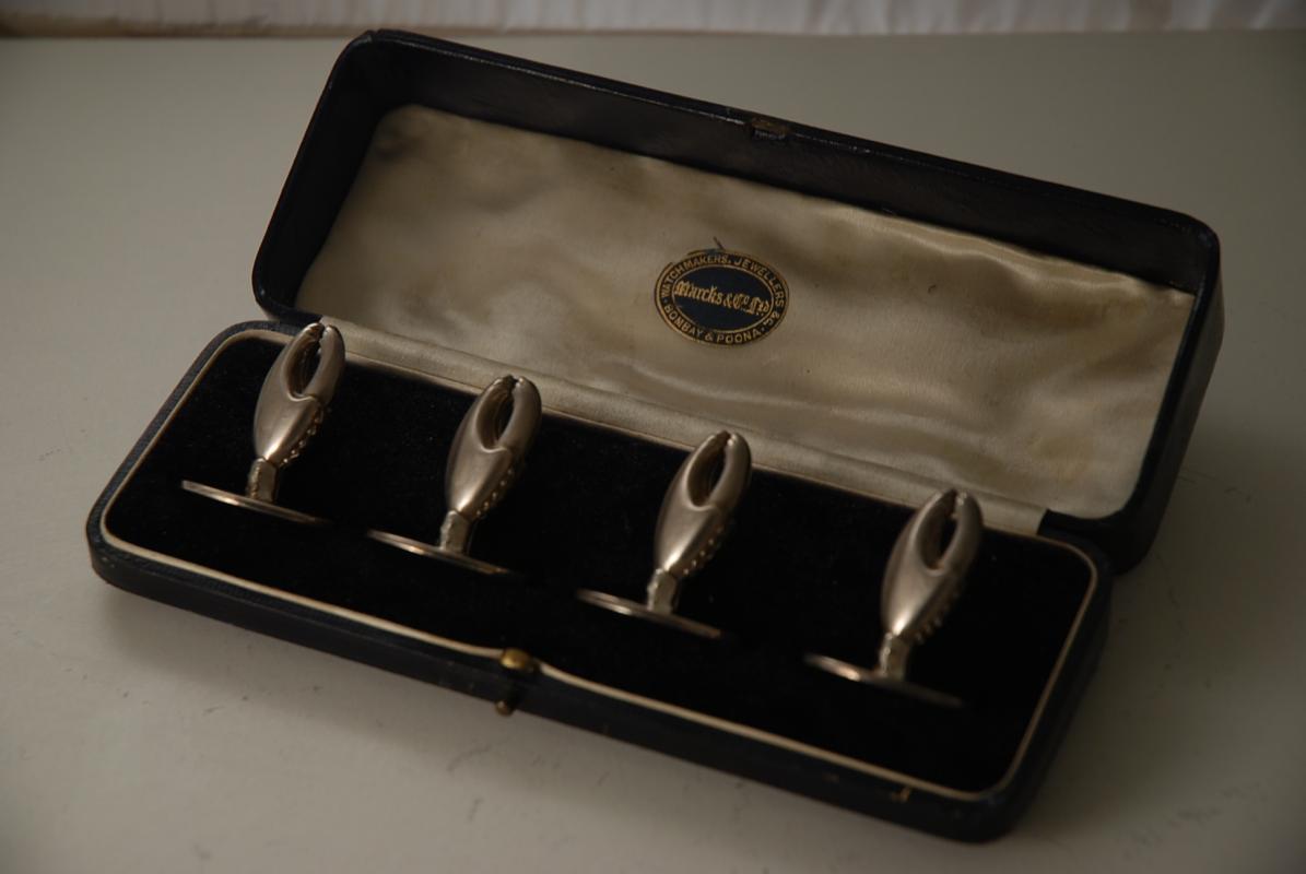 A Set of Samson Morden Novelty Silver Menu Holders in the form of Crab Claws