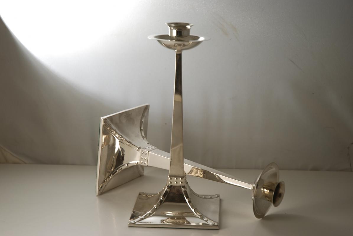A Pair of Arts and Crafts Silver Candlesticks by James Dixon and Sons