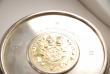 A Pair of Post War Silver Wine Coasters by Garrard and Alex Styles