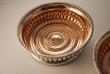 A rare pair of Regency Old Sheffield Plate wine coasters