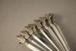 A Silver Flatware Set of 8 sterling silver Tea Spoons made by Georg Jensen in the Acanthus Pattern