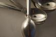 A Silver Flatware Set of 8 sterling silver Tea Spoons made by Georg Jensen in the Acanthus Pattern