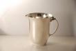 A Sterling Silver Cream Jug by Gerog Jensen