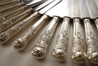 A Silver flatware set of Kings Pattern Knives