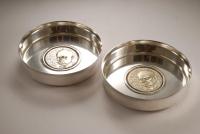 A Pair of Post War Silver Wine Coasters by Garrard and Alex Styles