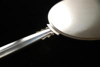 An Art Deco Silver Hand Mirror by Georg Jensen