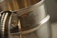 A Britannia Standard Silver Mug in the Queen Anne Style