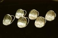 A Fine set of Art Nouveau Silver Menu Holders