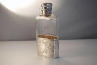 A Silver and Crystal Hip Flask