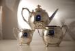 A Victorian Silver Plate Aesthetic Movement 3 Piece Tea Set